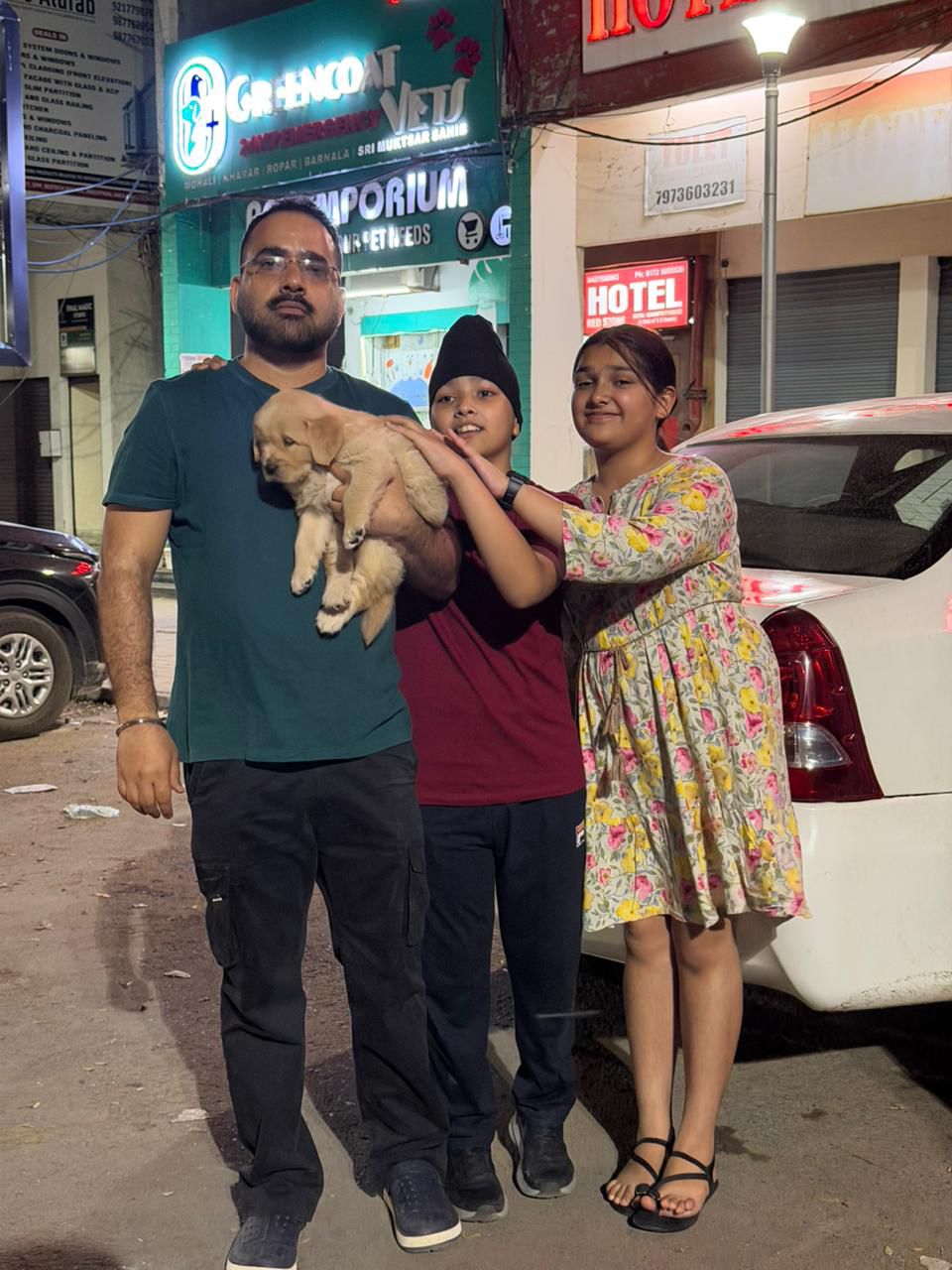 Customer holding healthy puppy from Kharoud Kennel