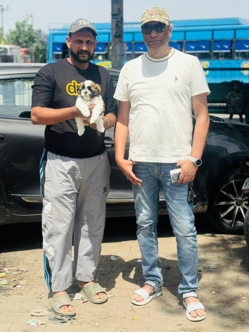 Happy family with their new Labrador puppy from Kharoud Kennel