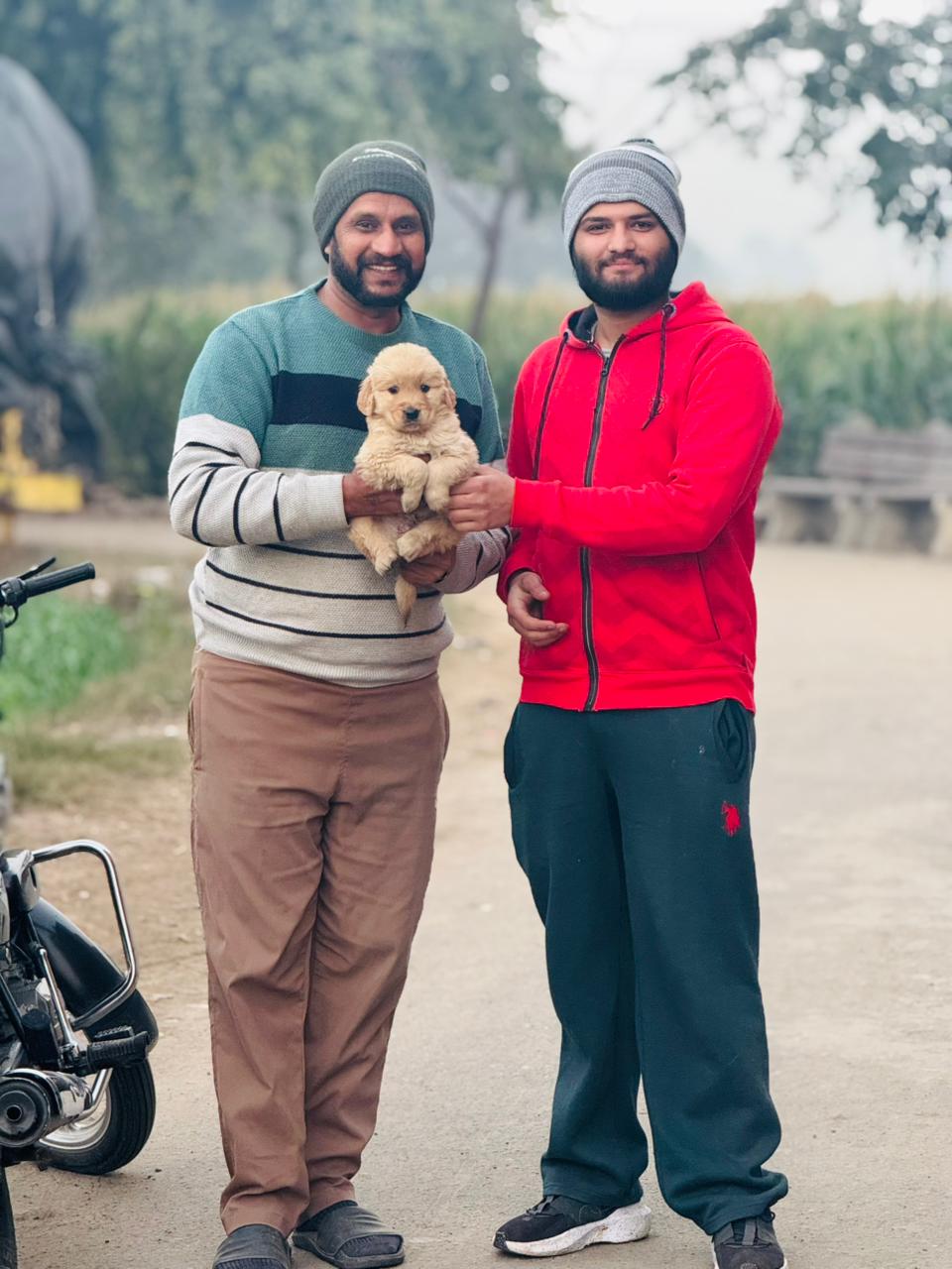 Puppy with happy child and family in Punjab