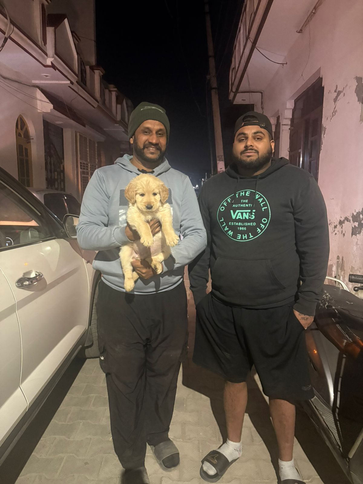 Smiling customer with their new furry companion